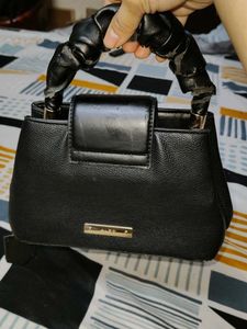 Chic Black Handbag with Scrunchie Handle