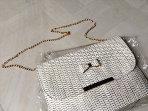 White &amp; Gold Clutch Bag