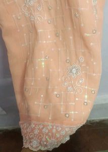orange kurta set with beads work