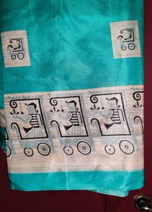Elegant Teal Silk Saree with Unique Print