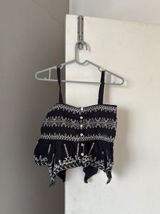 Embroidered Black Peplum Top