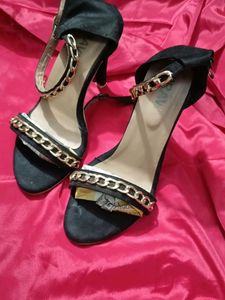 Chic Black Heels with Gold Chain Detail