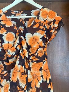 Vibrant Floral Print Sheer Top