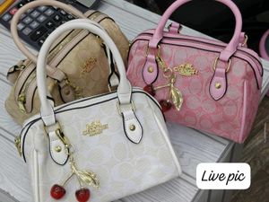 Coach Signature Cherry Charm Crossbody Bag
