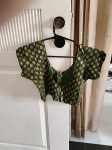 Elegant Green Saree with Gold Accents