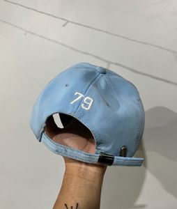 Light Blue Baseball Cap with Black Lettering