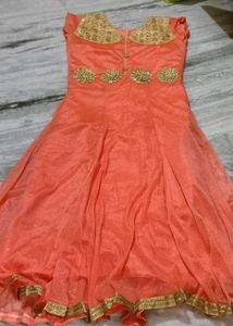 Elegant Coral Dress with Gold Embellishments