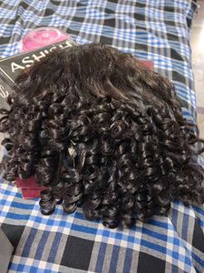 Curly Dark Brown hairs