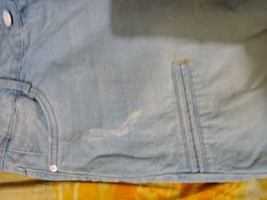 Light Wash Distressed Denim Jeans