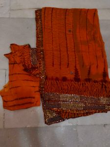 Orange Saree with Embellished Blouse sibori print