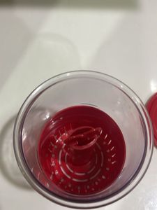 Red pickle container