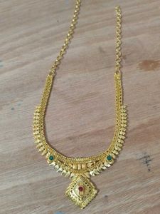 Elegant Gold Necklace with Red & Green Stones