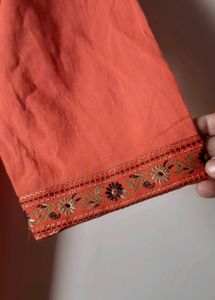 Unused Rust short embroidered Kurti.