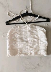 White sleeveless top