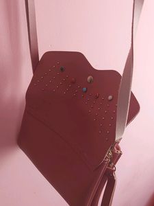 Peach Colour Sling Bag With 2 zips Can Carry Mobile ,wallet Cards And Make Up Items.