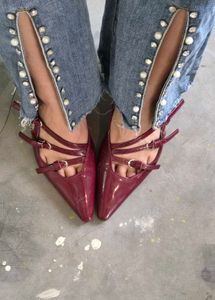 Flared Jeans with Studded Slits