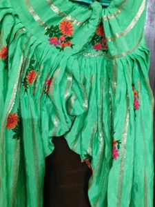 get free green paranda Orange Salwar Kameez