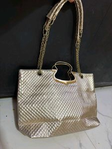 Elegant Gold Embellished Handbag