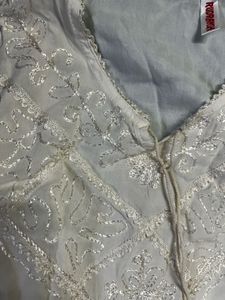 White Embroidered Sleeveless Kurta