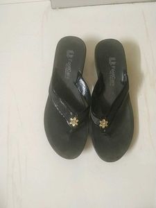 Black Flip-Flops with Floral Accent