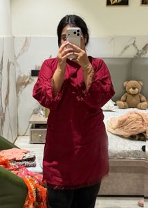 maroon kurta.