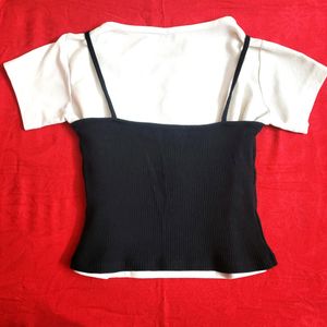 White croptop with black tank top