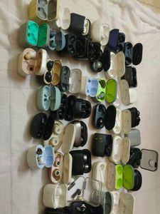 Assorted Earbud Cases and Earbuds