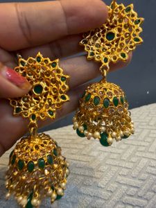 Exquisite Gold Plated Jhumka Earrings with Green S