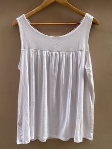 White Sleeveless Top with Embellished Neckline