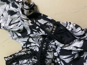 foral deep v neck dress with cross back design