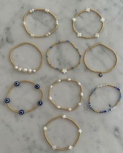 Delicate Pearl Necklace with Gold Accent