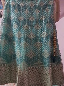 Beautiful Teal Lehenga with Intricate Embroidery