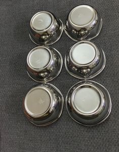 Set of 6 Stainless Steel Bowls and spoon