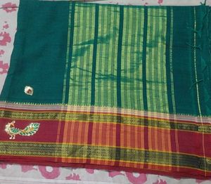 Dark green &amp; maroon Saree with golden  peacock
