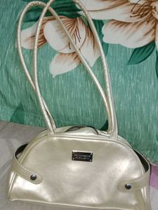 Cream Patent Handbag
