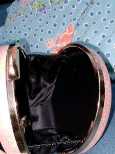 Sparkly Pink Round Clutch