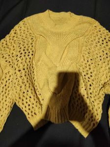 Yellow knitted sweater