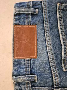 Distressed Blue Denim Jeans