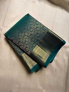 Elegant Teal Silk Saree with Gold Border