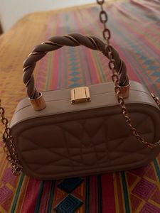 Quilted Oval Handbag