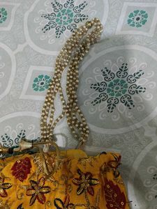 Embroidered Yellow Potli Bag
