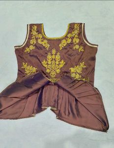 Embroidered Peplum Top