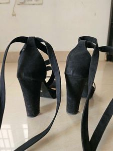 Black Platform Lace-Up Heels.