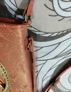 Elegant orange Embellished Sling Bag