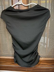 short sleeved black top