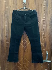 Black Flared Jeans with Grommets