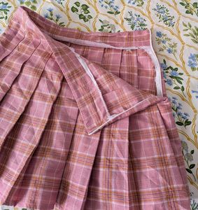 pink pleated checked skirt