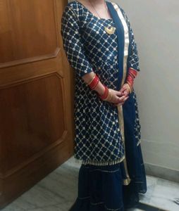 newly sharara suit with embroidery and stars work and also duptta work with lase