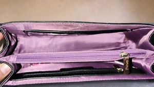 Chic Black Handbag with Gold Accent