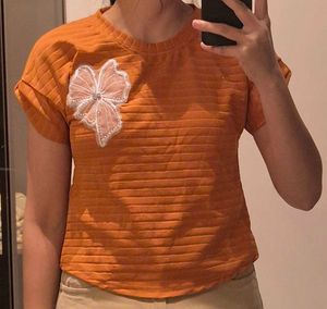 Cute Orange Top with Bow Accent